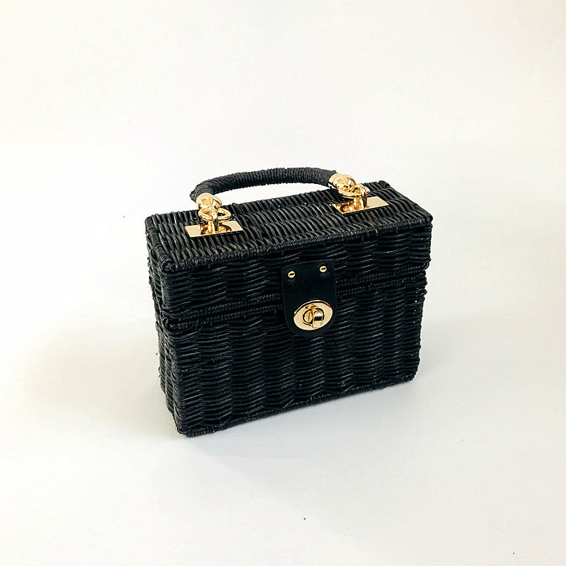The Woven Bamboo Handle Straw Bucket Bag