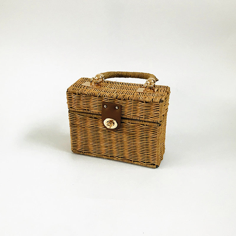 The Woven Bamboo Handle Straw Bucket Bag